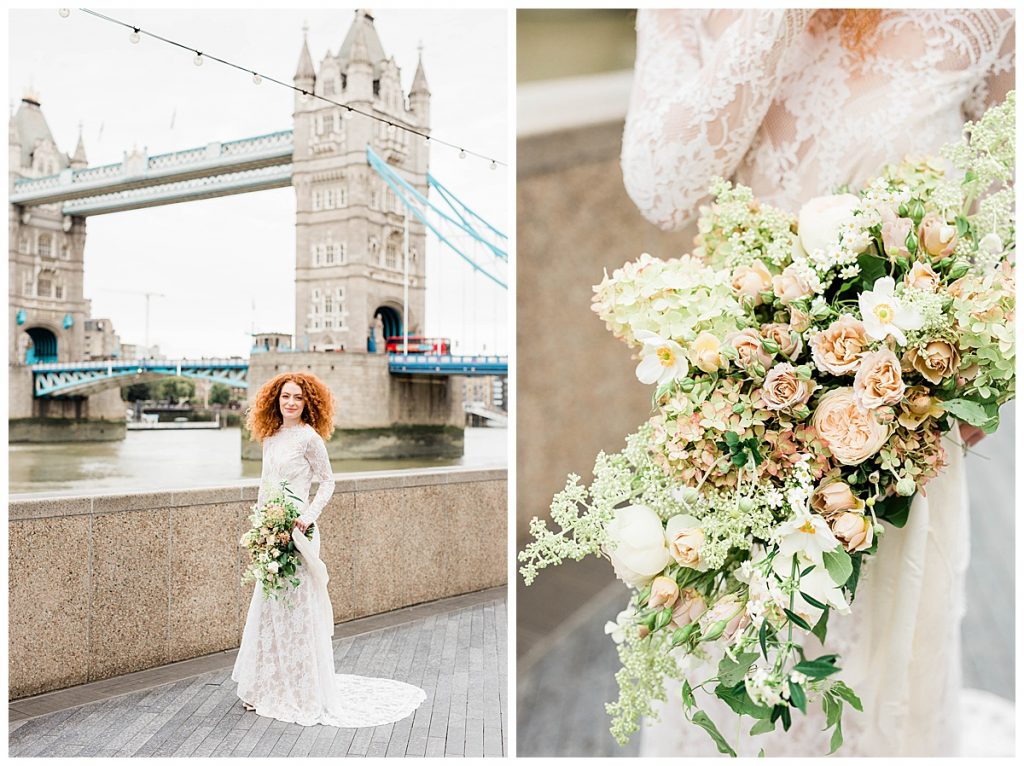 Bride in Claire Pettibone dress in front of Tower Bridge with a bouquet