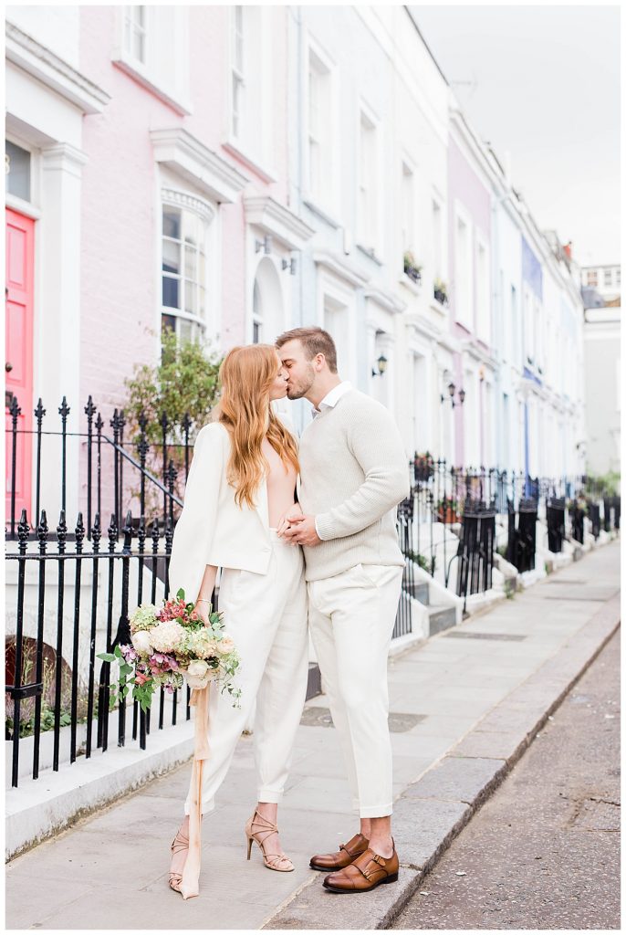 couple on sidewalk in Notting Hill