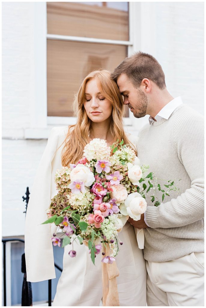 Couple with bouquet in Notting Hill